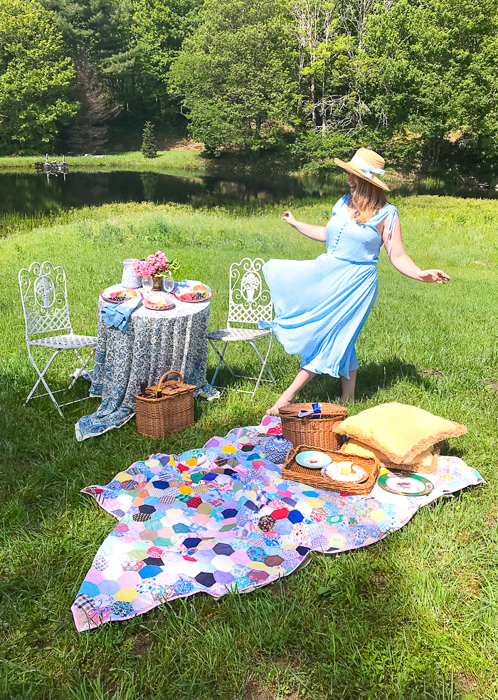 Katherine's blue dress swishes in the wind