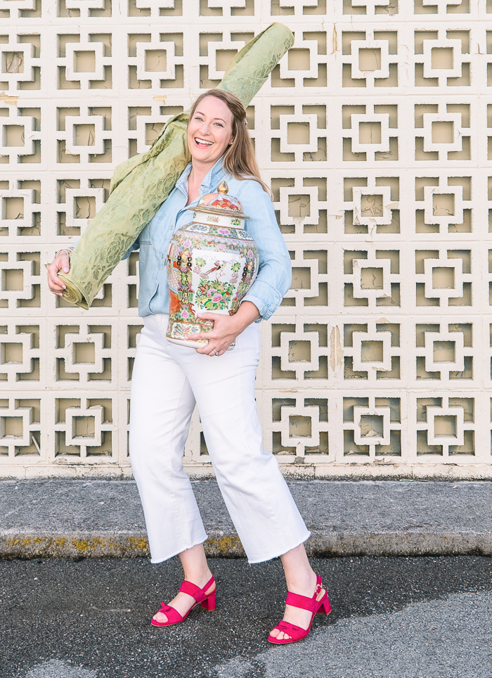 Katherine dashes downtown hunting antiques and fabric in her pink sandals from Sarah Flint