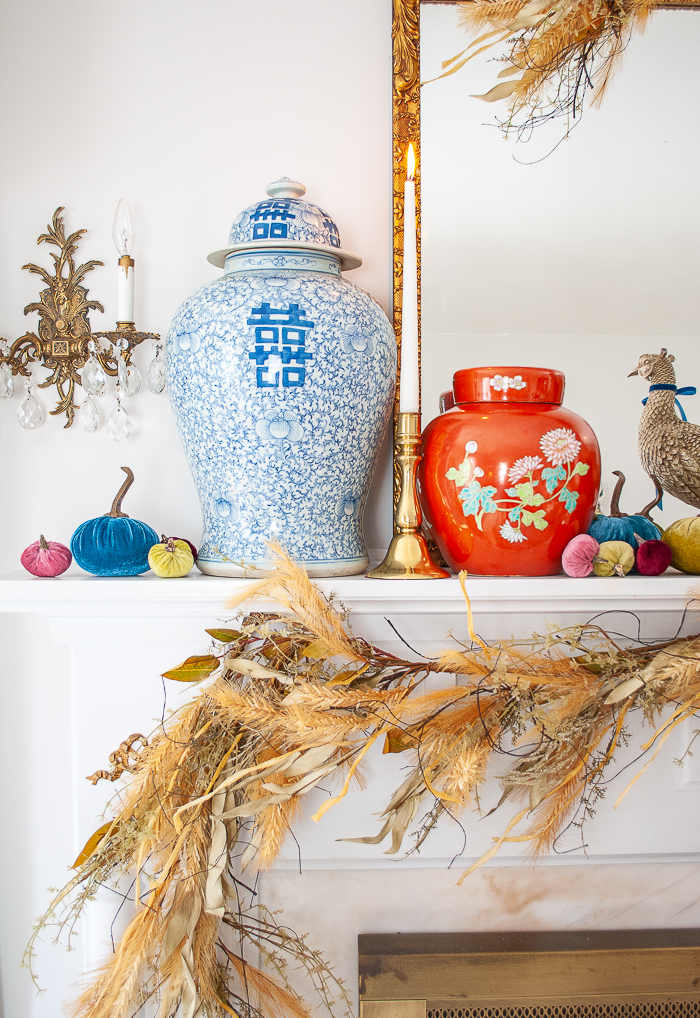 Double happiness temple jar nestled on fall mantel