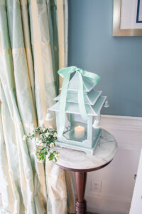 Blue and white pagoda lantern with mint green bow on top