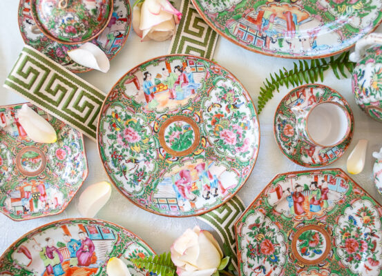 Flat lay of Rose Medallion plates and cups showing differences in designs internal in understanding Rose Medallion 101