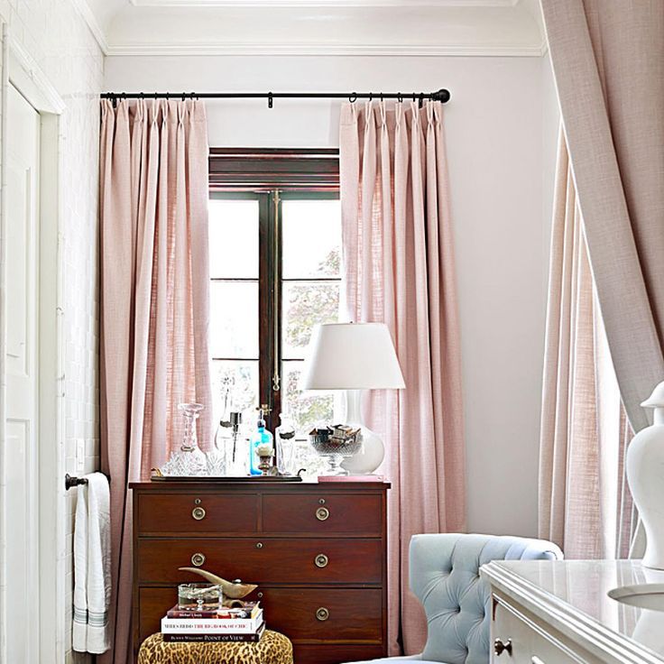 Dressing room with pale pink curtains