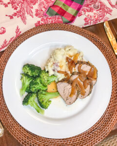 Plated pork loin, mashed potatoes, and broccoli for a delicious Sunday supper menu idea