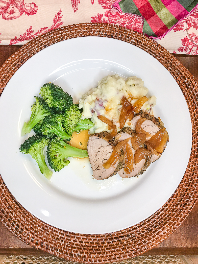 Plated Sunday supper with red bliss Ranch mashed potatoes, pork loin, and steamed broccoli