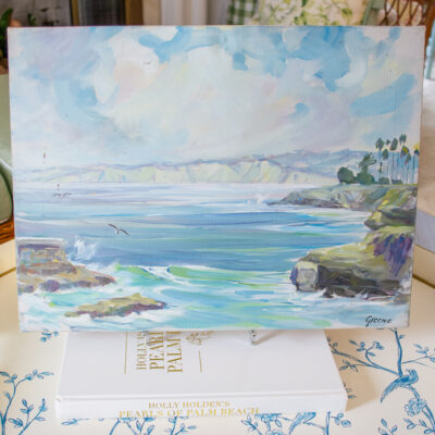 Seascape painting with coast line visible and gulls
