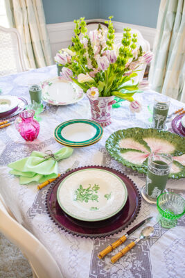 Wedgwood Patrician Robert soup bowls on a purple glass charger make an elegant look for springtime tables