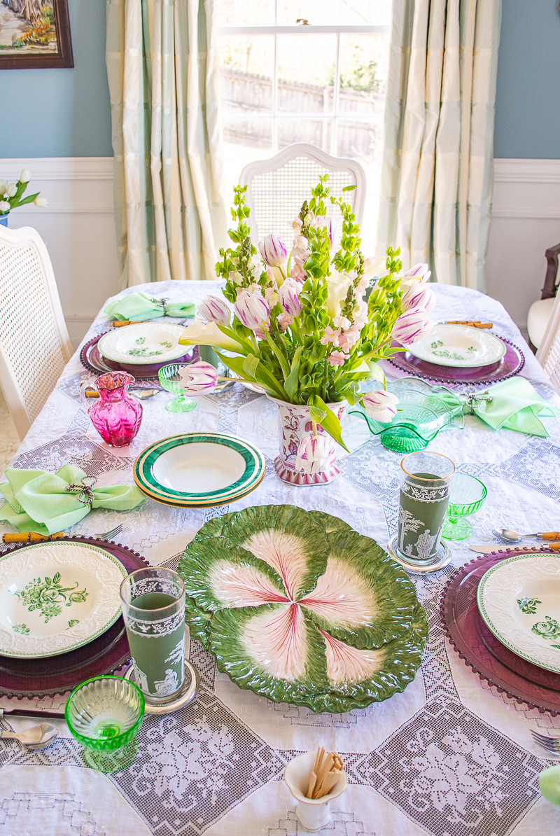 Straight on view of entire green and white tablescape perfect for spring meals