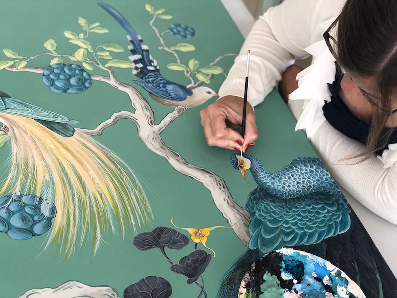Allison Cosmos working on a painting