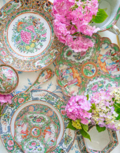 5 ways of decorating with Rose Medallion porcelains - flat lay collage of Famille Rose plates and tableware