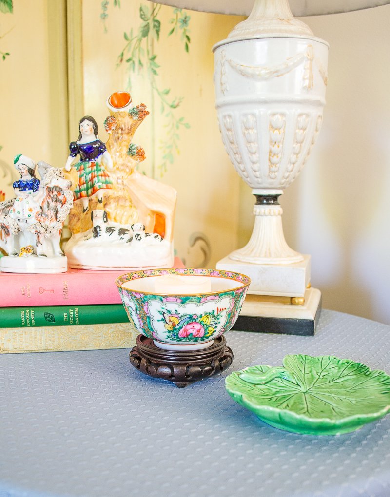 Table vignette with Rose Canton tea bowl used as candle holder