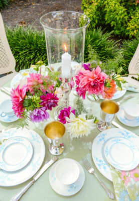 Silverplate and glass candle hurricane with dahlias for summer table centerpiece