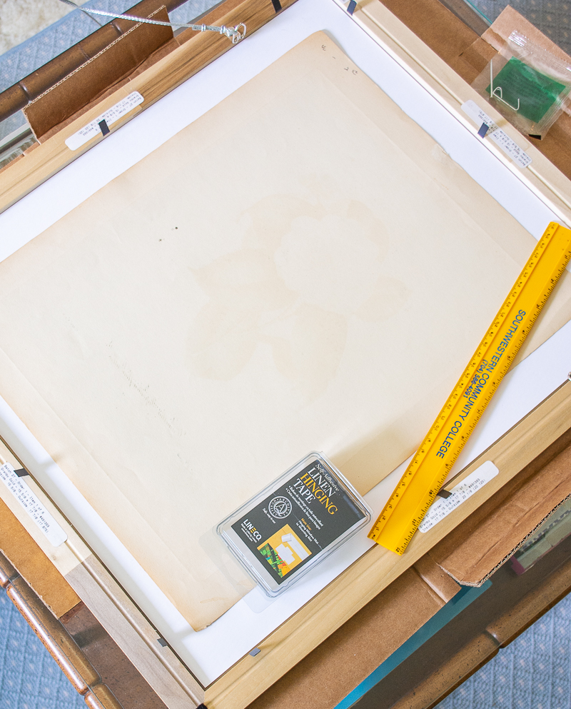 Gather materials for matting and framing print and work on clean flat surface