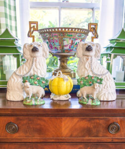 Classically charming curios: Pair of Staffordshire spaniels and sheep with Rose Medallion ormolu bowl in back