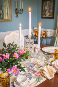 a three arm crystal candelabra creates a dramatic centerpiece for this Thanksgiving table look