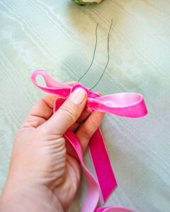 single loop bow in pink velvet with floral wire through back