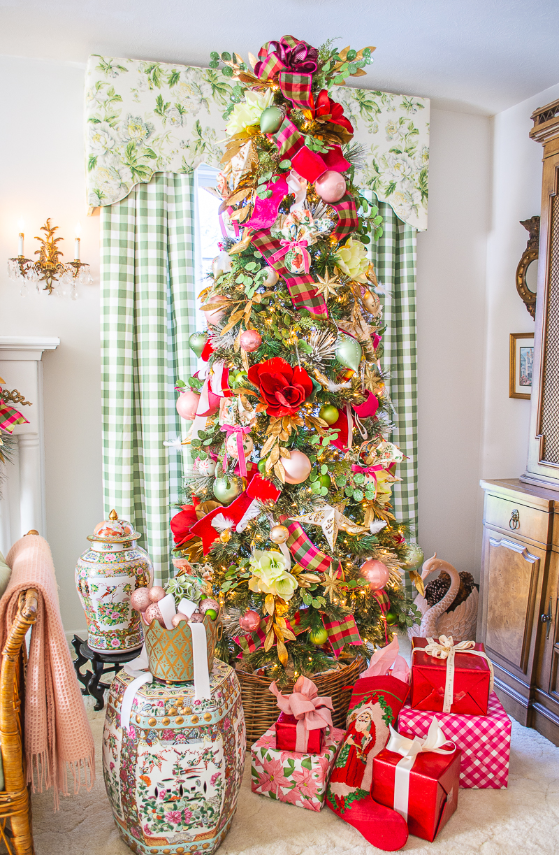 Grandmillennial Southern Christmas tree in pink and green with plaid ribbon, velvet magnolia blooms, vintage ornaments, and Althea fabric ornaments