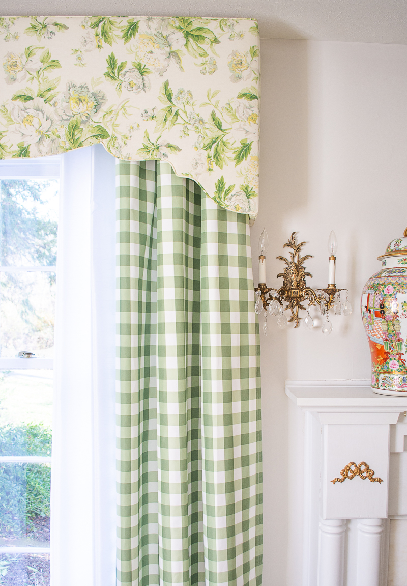 Grandmillennial style window treatments with chintz upholstered cornice in Waverly Fleuretta and green and white gingham curtains