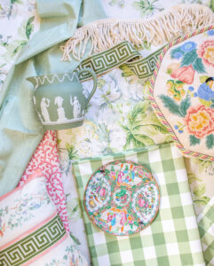 Pattern play flatlay with fabrics, patterns, and decor from my grandmillennial living room