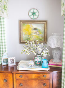 Create an eclectic layered look for your sideboard decor