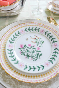 Botanical plates from Godinger create a Regency feel with out being staid