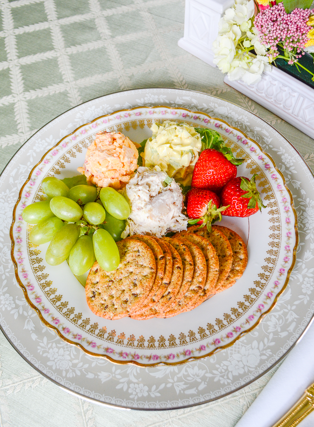 Classic Southern trio salad plate with chicken salad, egg salad, and pimiento cheese