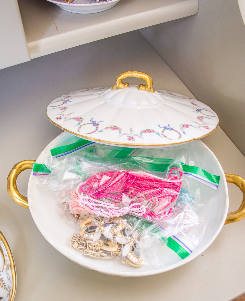 An antique Limoges tureen makes the perfect storage container for necklaces