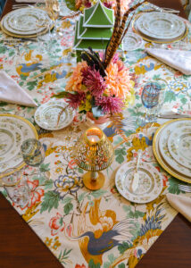 This Chinoiserie fall table is filled with elegant Royal Doulton china in the Tonkin patter, silverplate chargers, vintage Chinoiserie chintz, pagoda lanterns, and lush florals in peach, lilac, and green.