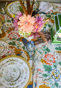 This Chinoiserie fall table is filled with elegant Royal Doulton china in the Tonkin patter, silverplate chargers, vintage Chinoiserie chintz, pagoda lanterns, and lush florals in peach, lilac, and green.