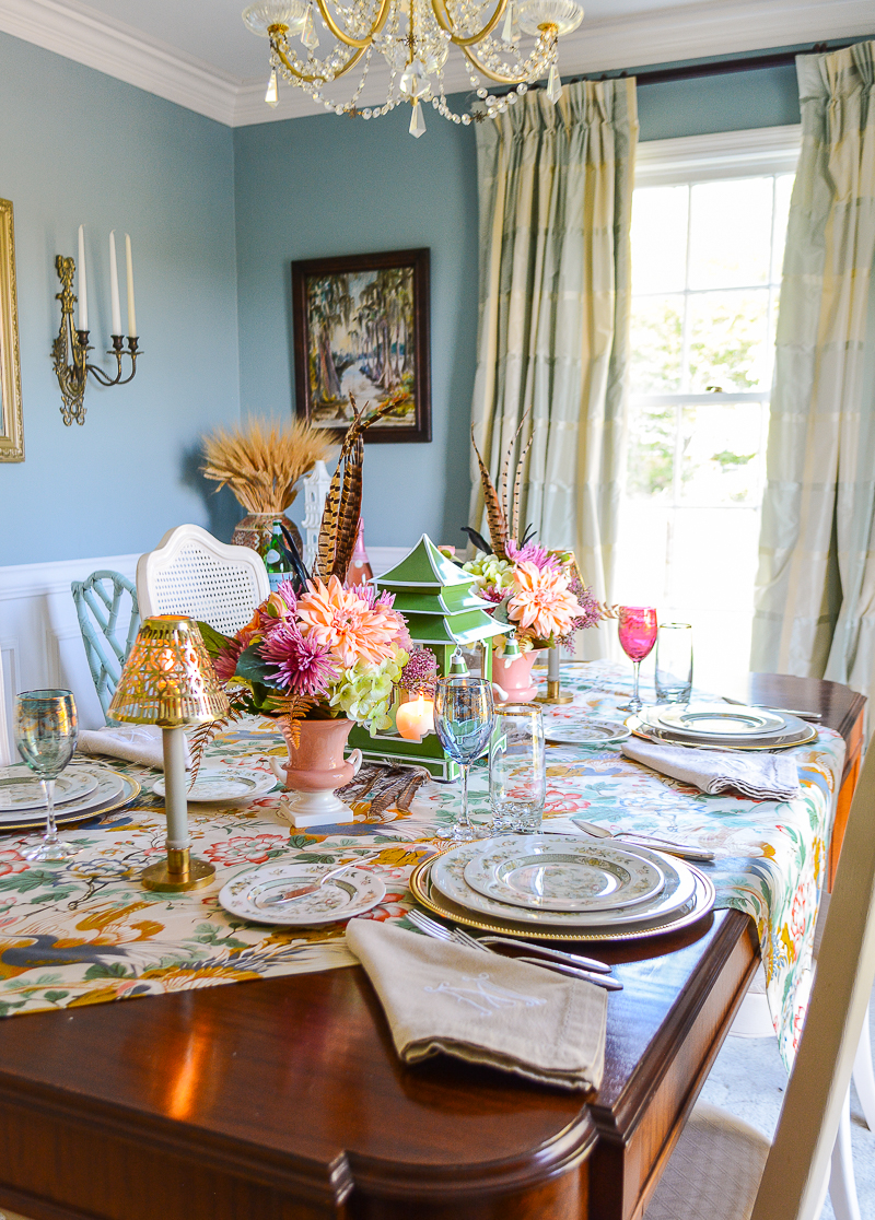 This Chinoiserie fall table is filled with elegant Royal Doulton china in the Tonkin patter, silverplate chargers, vintage Chinoiserie chintz, pagoda lanterns, and lush florals in peach, lilac, and green.
