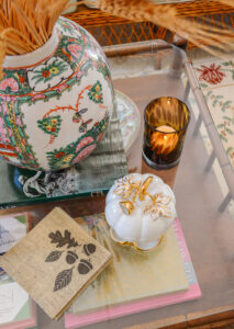 White ceramic Mottahedeh pumpkin candy dish adds a unique vintage touch
