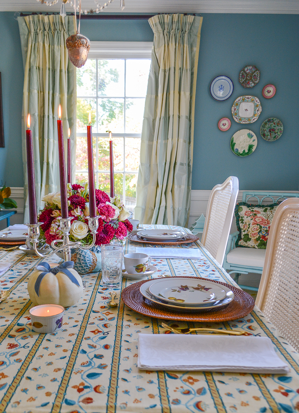 Set a refined Thanksgiving table in blue and brown with Grandmillennial vibes using Evesham dishes, Schumacher Sunnyside Vine, and antique heirlooms