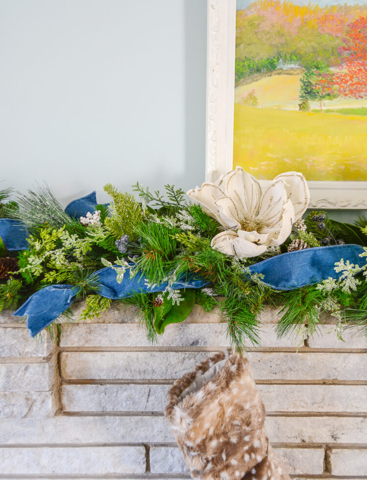 Shop this frosted garland featuring a wintery iced mix of pine, cedar, juniper, and magnolia. It is perfect for the mantel or stairs.