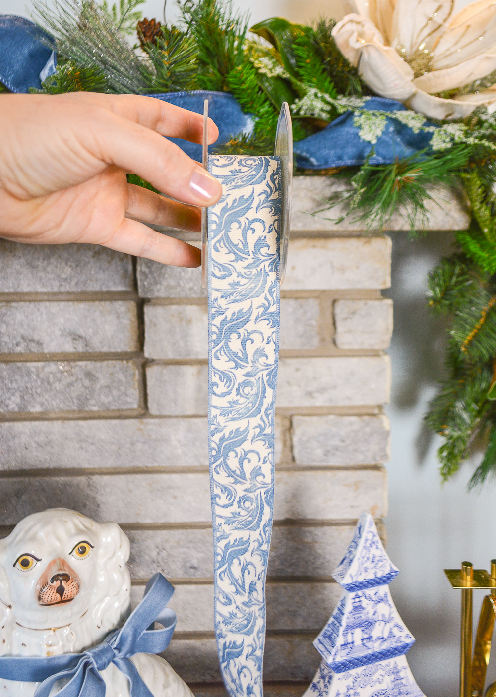 Shop this elegant blue and white scrolling design ribbon on penderandpeony.com