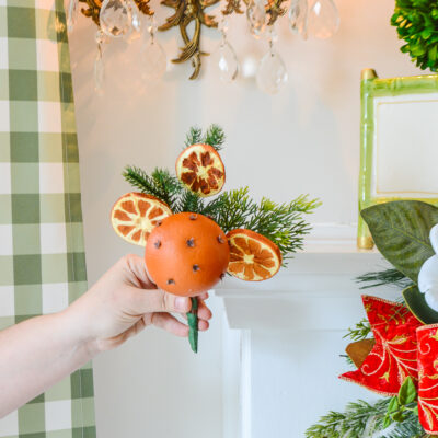 Shop these pretty faux orange and clove pomanders with dried orange slices and pine from Pender and Peony's holiday curation