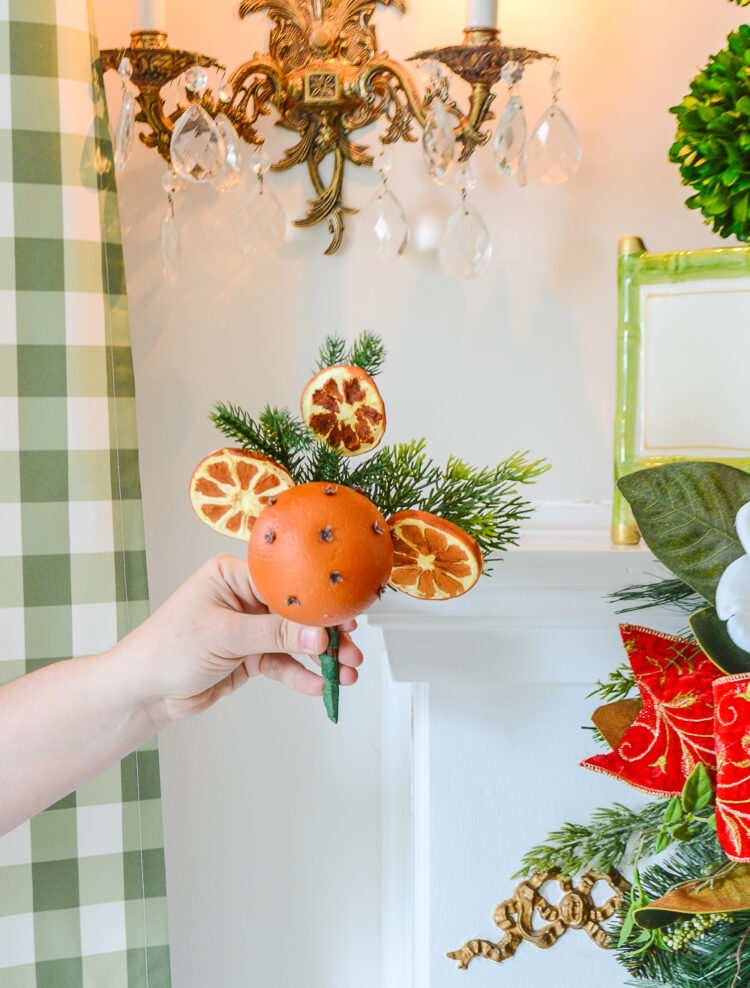 Shop these pretty faux orange and clove pomanders with dried orange slices and pine from Pender and Peony's holiday curation
