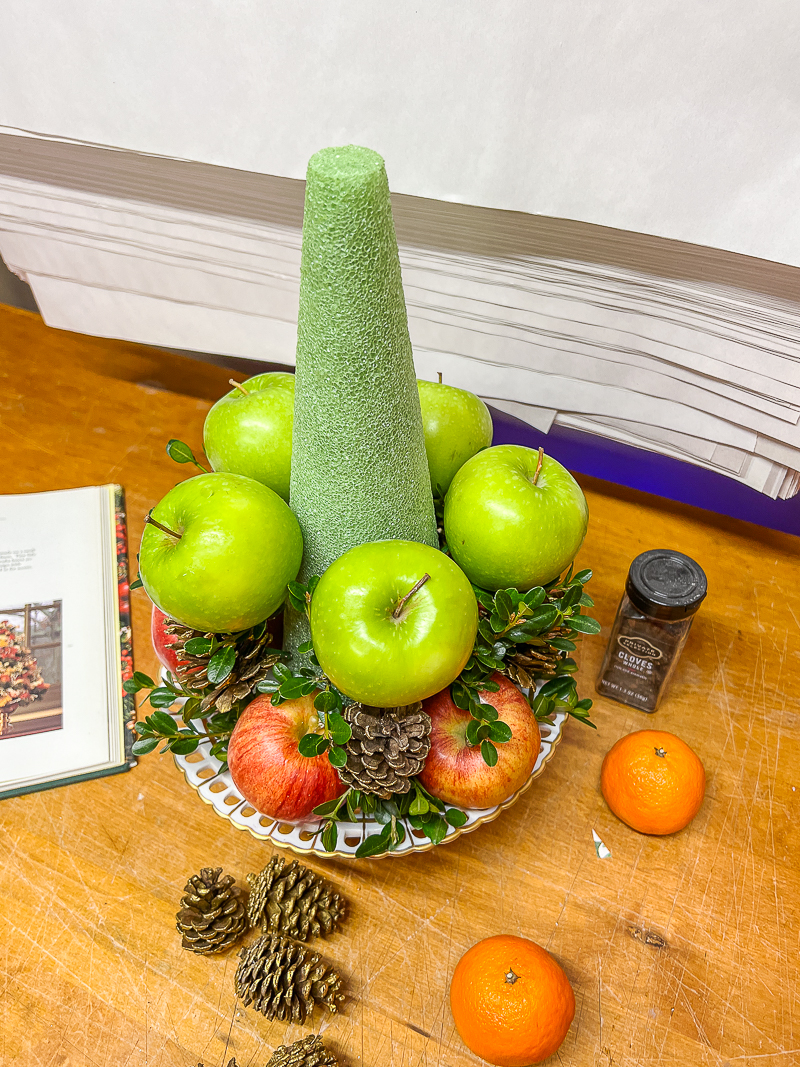 layer of green apples around foam cone