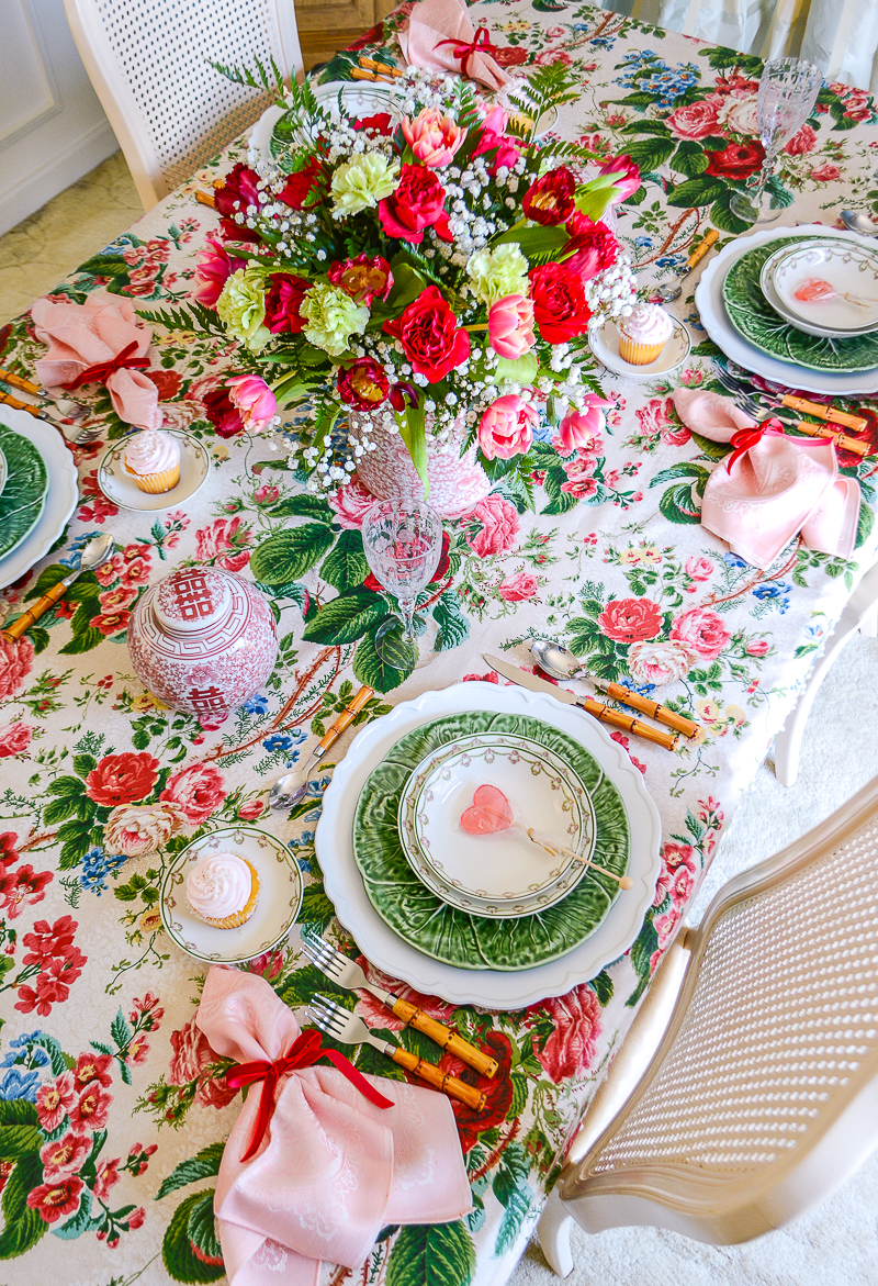 Valentine's Tablescape with Grandmillennial vibes and vintage chintz florals in vibrant red, pink, and green