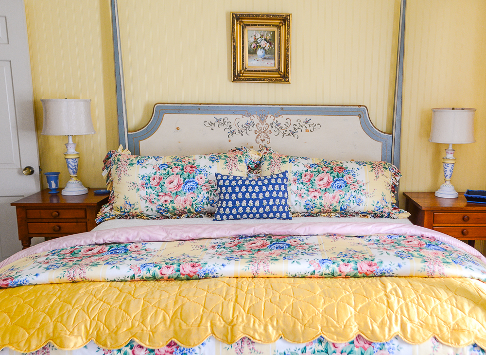 The challenge to decorating a guest room showing Katherine's newly renovated yellow and blue guest bedroom