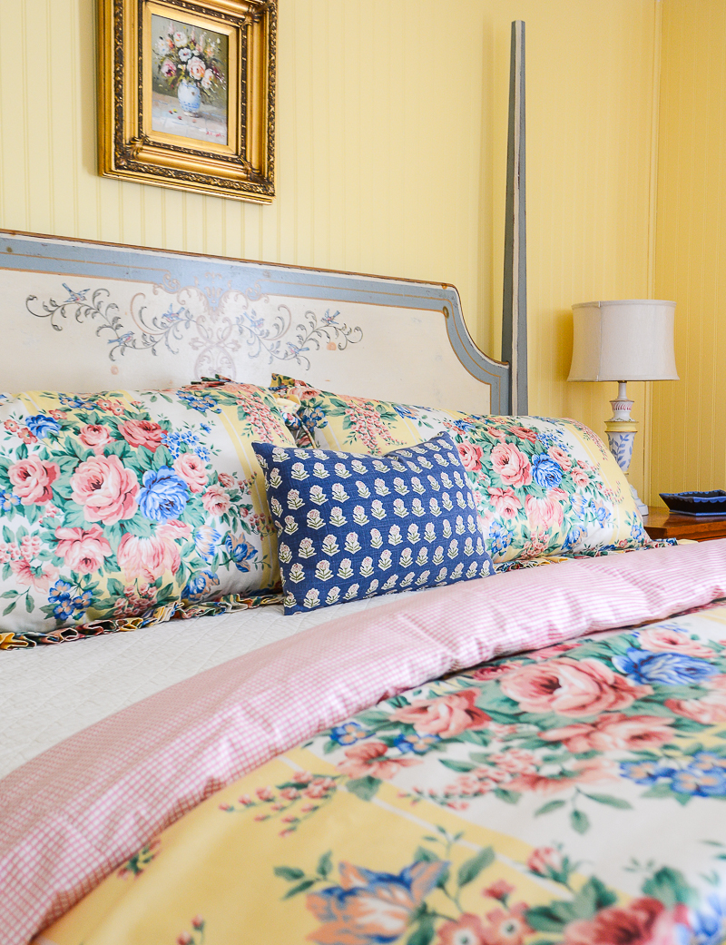 Decorating a guest bedroom - floral chintz bedding with block print pillow