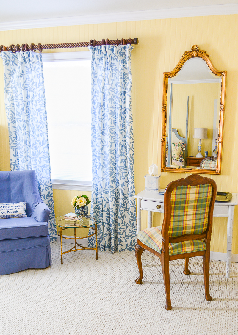 Our yellow and blue guest bedroom reveal that turned a sad boring room in to a happy yellow Grandmillennial retreat!