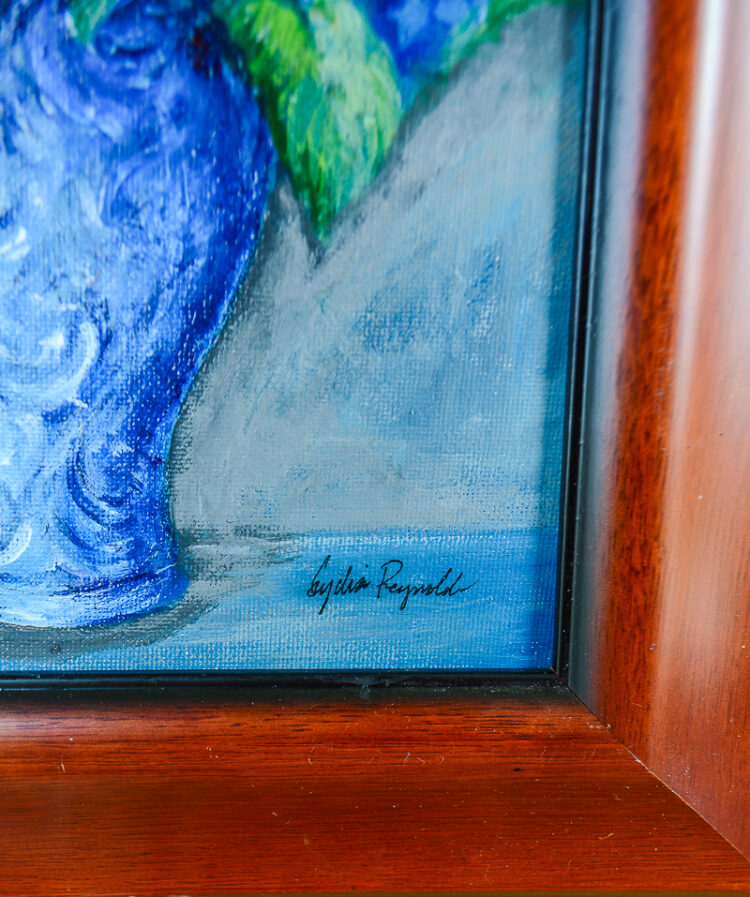 An original painting of blue hydrangea in blue and white vase by TN artist Lydia Reynolds.