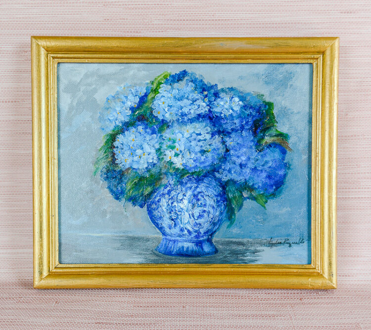 Original painting of blue hydrangea spilling out of a blue and white jar by TN artist Lydia Reynolds.