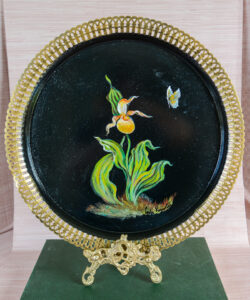 A revamped tray hand painted with lady slipper and butterfly.