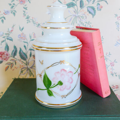 Shop this vintage apothecary jar in white satin glass with pink lotus design on Curio Collected at penderandpeony.com