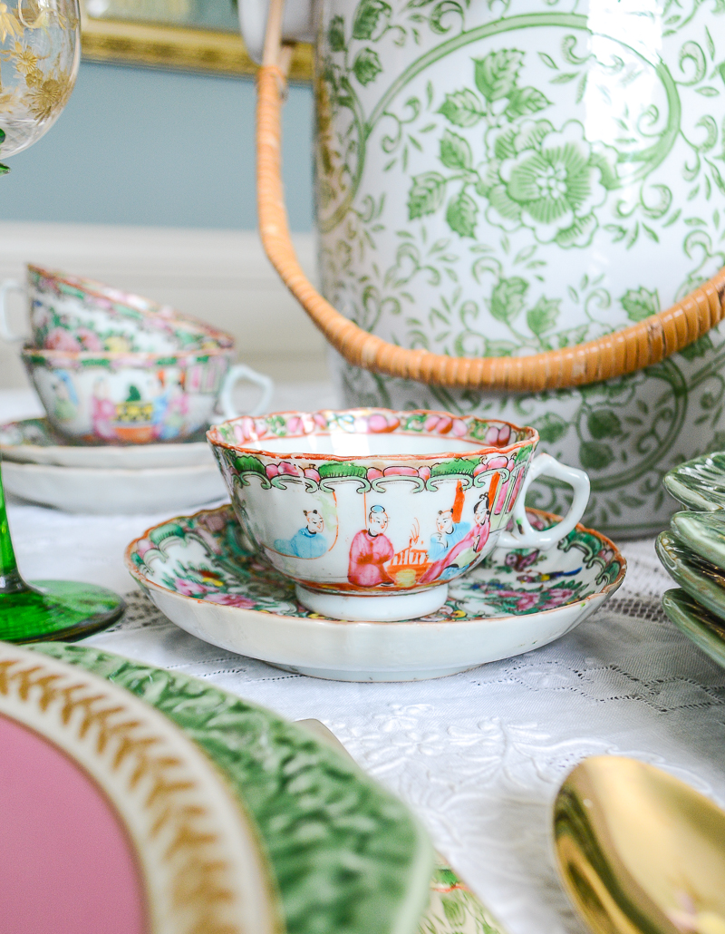 Antique Rose Medallion teacup on pink and green table
