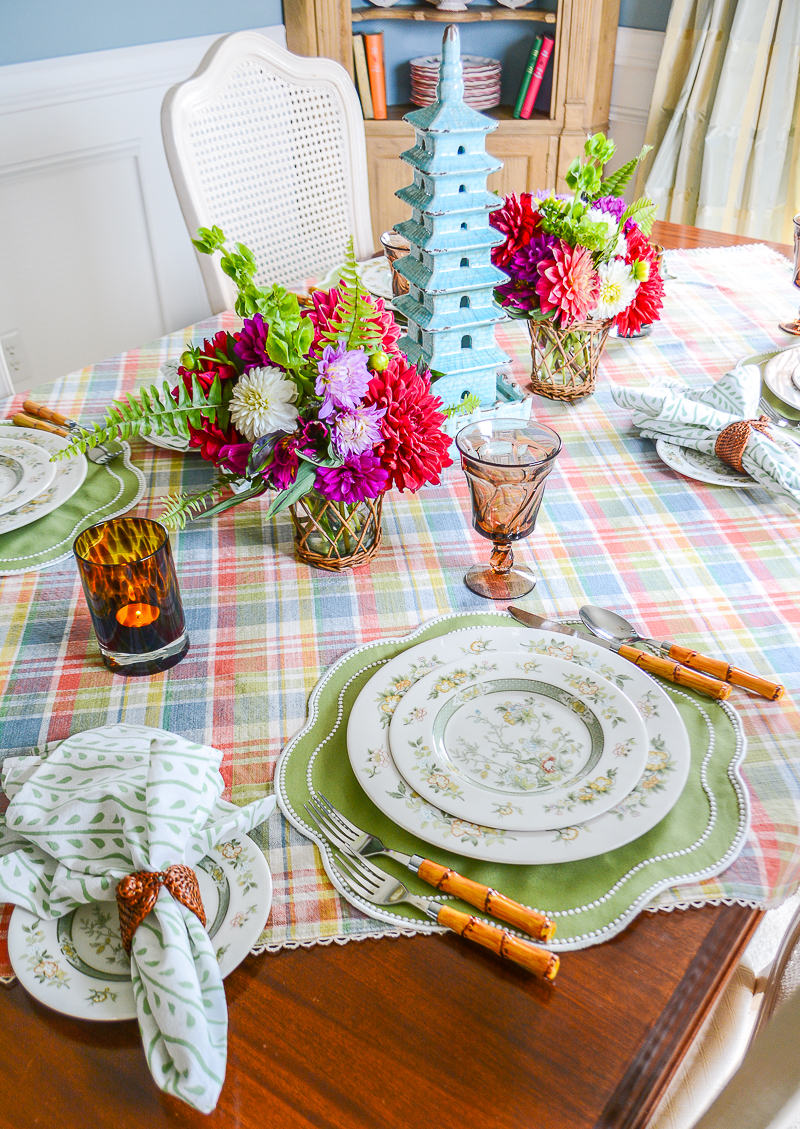 Chinoiserie fall table with Royal Doulton china, blue pagoda centerpiece, and dahlias on a plaid tablecloth