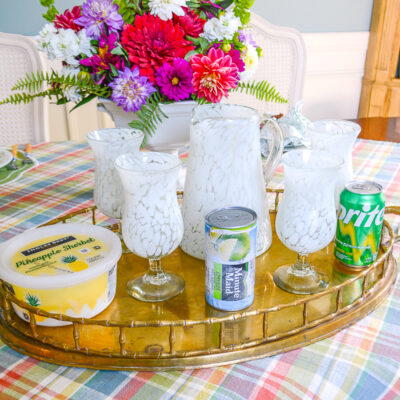White spotted blown glass pitcher and 4 glasses