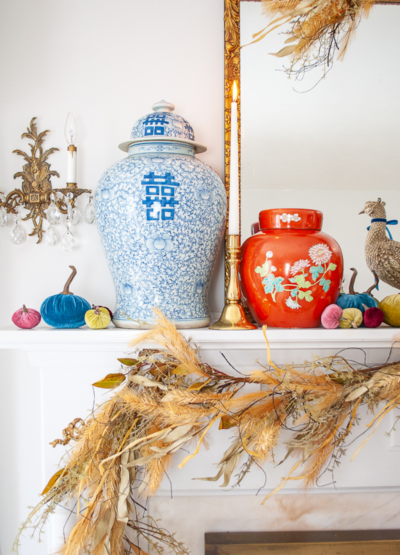 Vintage fall decor: blue and white double happiness temple jars on fall mantel