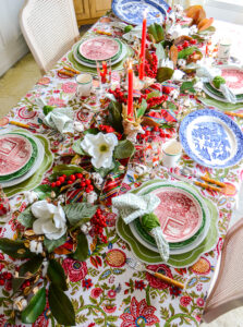 Thanksgiving to Christmas crossover table centerpiece - magnolia garland and reindeer candleholders