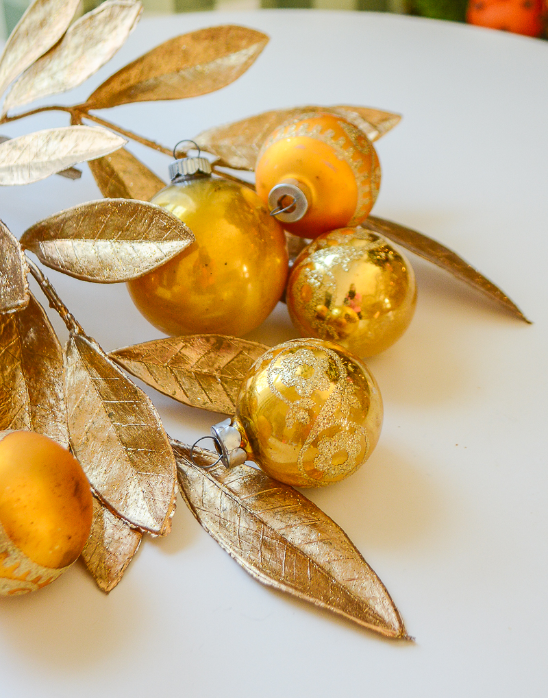 A fun glittery grouping of Midcentury glass ornament balls with designs on the four smaller ones. 4 mica glitter, unmarked and 2 Shiny Brites. Shop on penderandpeony.com